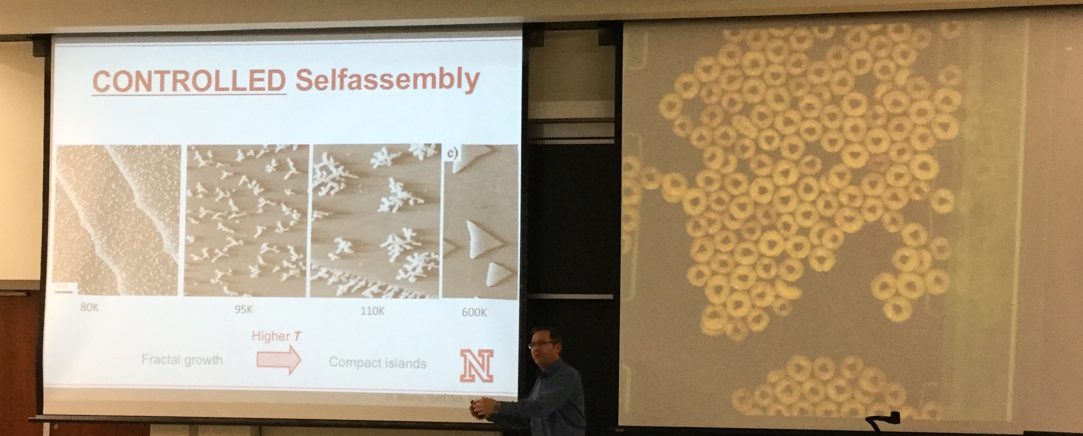 Fig. 4 (Click to enlarge). Dr. Enders demonstrates self-assembly in Cheerios (right) while presenting scanning tunneling microscopy (STM) images showing the self-assembly of silver atoms on a platinum substrate at various temperatures (left). (Click to enlarge.)
