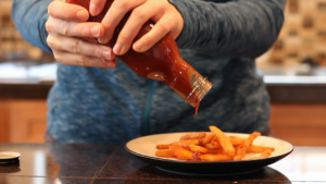 Ketchup is a classic shear-thinning fluid. Once it starts flowing, its viscosity drops and it flows more easily, which is why it can end up all over your fries. Photo by Nicole Sharp.